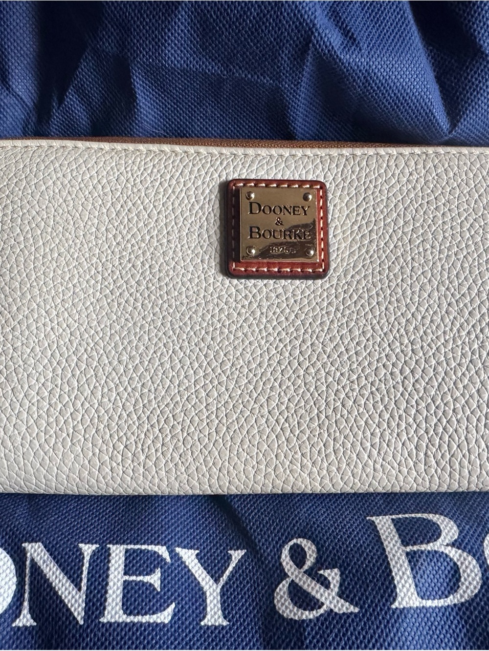 Dooney & Bourke White Pebble Leather Bifold Wallet with Brass Logo Plaque